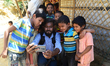 A Bangladeshi Photographer taking Selfi with Rohingya children in the Balukhali refugee ca...
