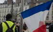 A thousand yellow vests (Gilets Jaunes) accompanied by anarchists militants (black blocs)...