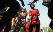 Girls and women survivors of violence dancing during a One Billion Rising campaign event i...