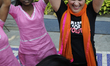 Eve Ensler- the founder of the One Billion Rising campaign dancing with Girls and women su...