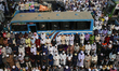 Bangladeshi Muslims offer Friday prayer on a road during the world's second largest Muslim...