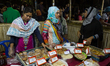 Pitha makers from all over the city gathered to sell their traditional pithas in Dhaka, Ba...