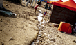 A little ditch is going through the streets of the Quru Gusik Refugee Camp cause of the ne...