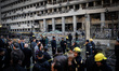 A suicide bomber struck Cairo police headquarters in the first of three bombings in the Eg...