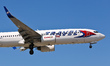 Travel Service airlines Boeing 737-800 ( specifically Boaing737-86N(WL) ) aircraft landing...