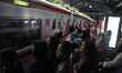 Employees of PT. Indonesia Commuter Line Trains (KCI) provided counseling to passengers re...