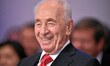 Shimon Peres, former President of Israel (2007-2014), smiles during the session 'An Insigh...