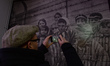 Auschwitz survivor, Mathias Hirsch's son, Michael Hirsch takes a picture of his Dad, datin...