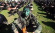Palestinian youths take part in a military-style graduation ceremony after being trained a...