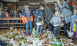 Family during the ceremony of blessing Easter basketsat at Good Shepherd Catholic Church,...