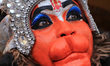An Indian man dressed as Hindu monkey god Hanuman during an annual Hindu religious festiva...