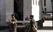 (140302) -- SANAA, March 2, 2014 (Xinhua) -- Yemeni soldiers escort an army vehicle carryi...