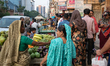 On 30 May 2019, Bengali people walk and ride rickshaws in crowded streets, markets and urb...