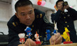 Chinese Navy officer constructing toys for the Chinese New Year Eve, in Athens, Greece, on...