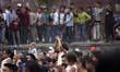 Nepalese devotees observing the bejeweled vest known as Bhoto during celebration of Bhoto...