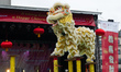 Acrobats perform a flying lion dance as part of The Chinese New Year Celebration 2015 in T...