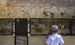 A young jewish boy in front of western wall, in Jerusalem old city, Israel, on 24 February...