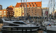 Luxury boats and yachts sitting in the Gdansk marina n front of Gdansk Hotel on the Szafar...