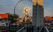 Ferris wheel and bascule bridge on the Wyspa Spichrzow island are seen in Gdansk, Poland o...
