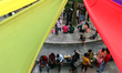 People are seen enjoying various social and cultural activities during the Mango Festival...