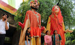 People are seen enjoying various social and cultural activities during the Mango Festival...