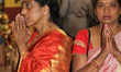 Tamil Hindu devotees offer prayers during the Vinayagar Ther Thiruvizha Festival at a Tami...