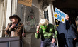 A protester dressed as the comic-book character the Incredible Hulk takes part in a demons...