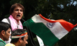 Indian National Congress party senior leader Raj Babbar shout slogans as they attend a pro...