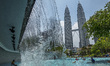 Water falls from fountain at Kuala Lumpur City Center (KLCC) water park in Kuala Lumpur, M...