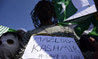 A Kashmiri man wearing concertina wire around his face to protest the ongoing blockade aft...