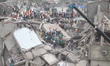 (FILES) In this photograph taken on April 25, 2013,Rescue workers take part in the rescue...