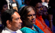 Sri Lanka's former president Chandrika Kumaratunga (C) looks on during a rally in Colombo...