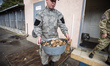 Porridge with meat and boiled fish for feeding dogs at Militia Dog Training and Breeding C...