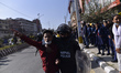 A Nepalese Student caught by police stage a demonstration in Kathmandu, Nepal on Sunday, N...