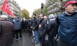 General Secretary of CGT union Philippe Martinez (3R) takes part in a march near the Gare...