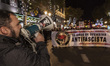 Protester with a speaker shouting slogans in an antifascist demonstration in Madrid, Spain...
