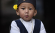 A Portrait of little kid in a traditional attire ready for celebration Saat Gaule Jatra fe...
