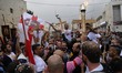  during the Holy Fire ceremony in the West Bank town of Bethlehem, on April 11, 2015.  The...