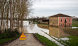 The river 'l adour' has flooded and impacts houses, fields,roads  in the village of Onard,...