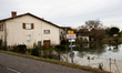 The river 'l adour' has flooded and impacts houses, fields,roads  in the village of Onard,...