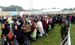 People wait to pay their respects to the late Sir Fazle Hasan Abed, the founder of the Ban...