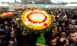 People wait to pay their respects to the late Sir Fazle Hasan Abed, the founder of the Ban...