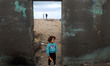  Children play in a deserted house at the Shati Palestinian refugee camp during stormy wea...
