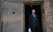 Yonatan Langer, a former neo-Nazi, on his way out from the gas chamber inside Auschwitz I...