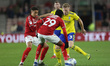  Kristian Pedersen of Birmingham City in action with Djed Spence and Marcus Tavernier of M...