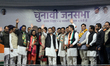 Indian National Congress (INC) leader Rahul Gandhi and Priyanka Gandhi campaign during a r...