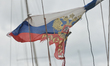 A Russian national flag seen at Tel Aviv harbour on a yacht during a stormy weather. Isra...