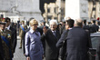 Italian President Sergio Mattarella greets to the people  after a  ceremony to mark the an...