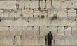 A man prays at The Western Wall, Judaism's holiest prayer site, in Jerusalem's Old CityOn...