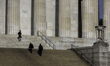 Few people are seen at the steps to the Lincoln Memorial amid a dramatic downturn in touri...